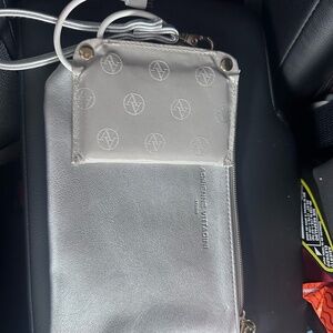 Adrienne Vittadini Studio Silver Wristlet with Charging Capability